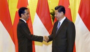 Presiden Indonesia Joko Widodo menghadiri pertemuan dengan Presiden China Xi Jinping (REUTERS)