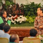 Jokowi dan pengemudi ojek online (IST)