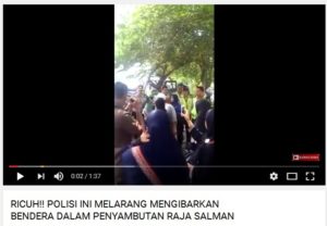Polisi menyita bendera Arab Saudi dan Indonesia (IST)